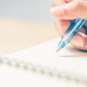 7 Crucial Reasons to Record, Write and Relay Your Life, Right Now Business women hands working writing notebook on wooden desk, lighing effect